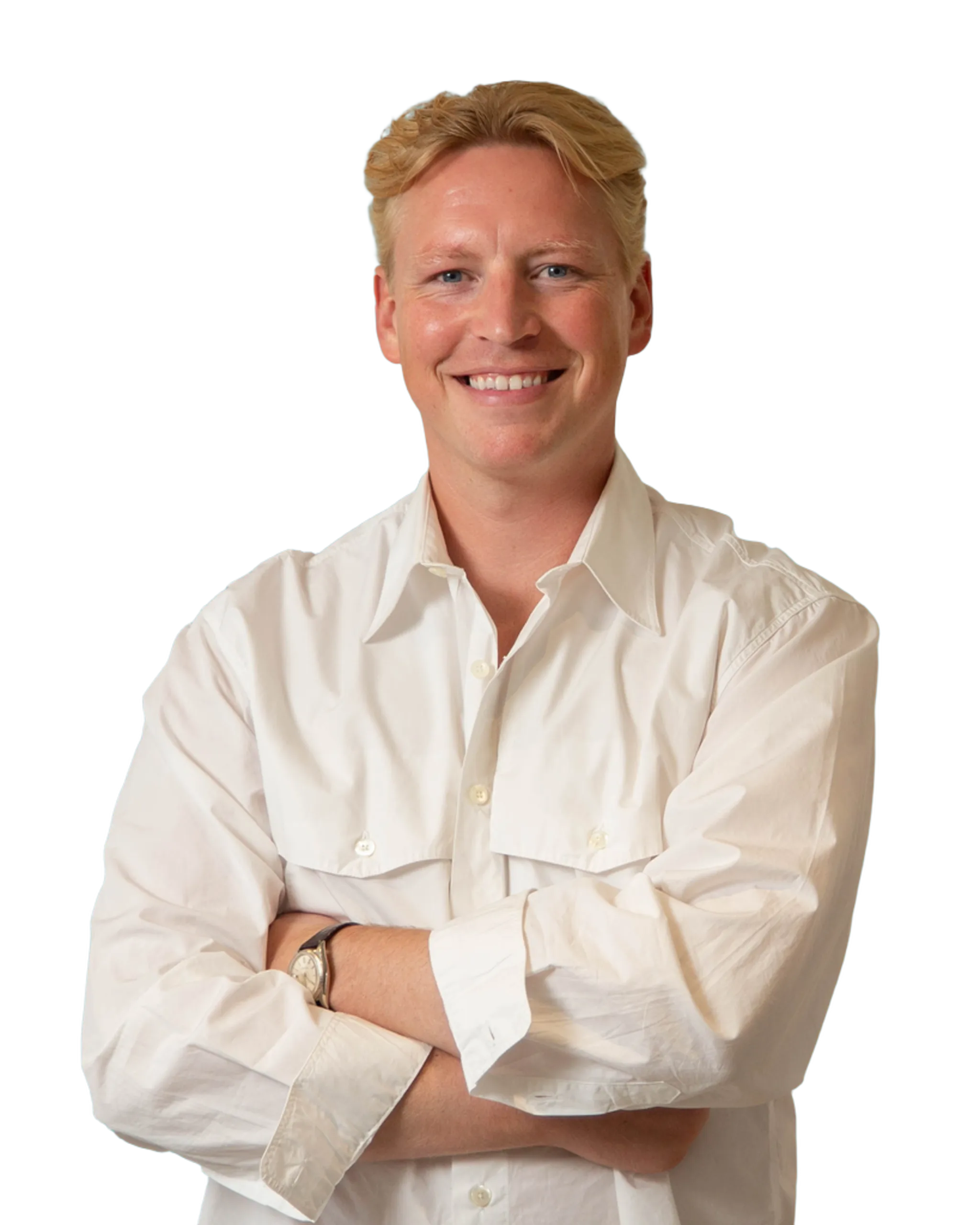 Frederik Thyssen smiling with arms crossed