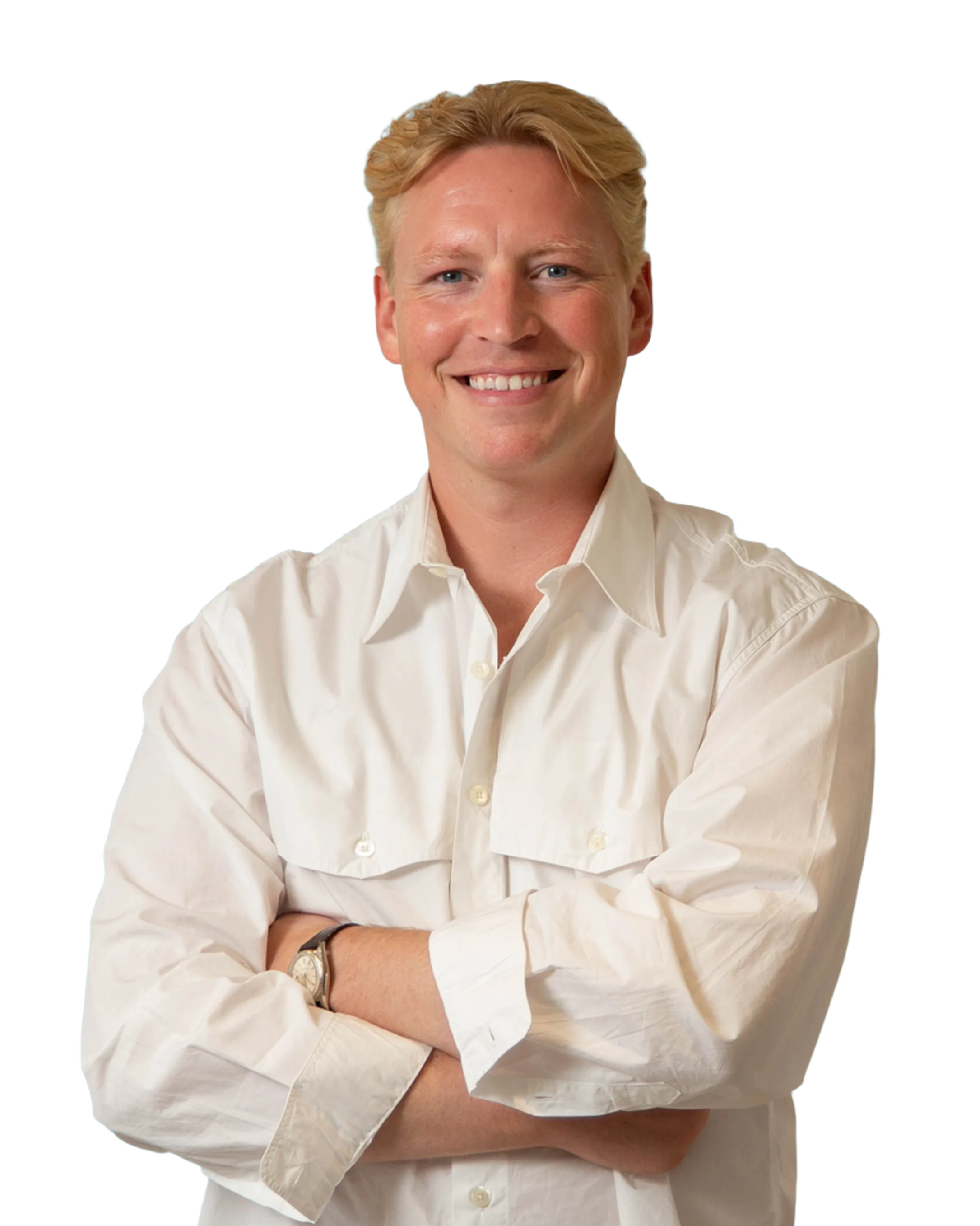 Frederik Thyssen smiling with arms crossed